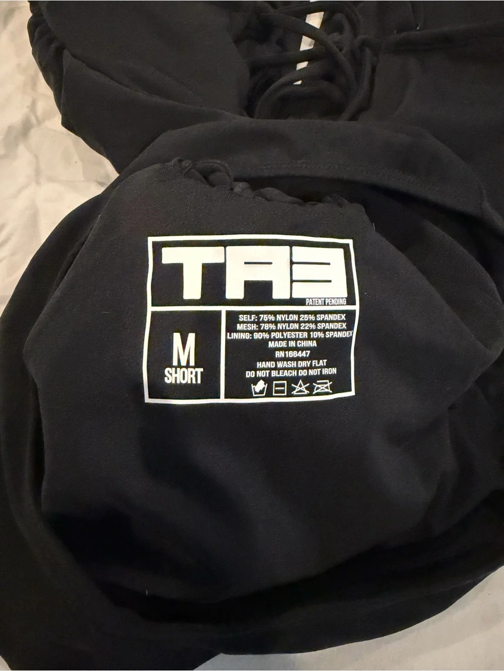 TA3 Converty Black in Medium Short
